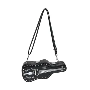 Detailed view of black guitar shape crossbody bag with rivets and white strings for women Y2K