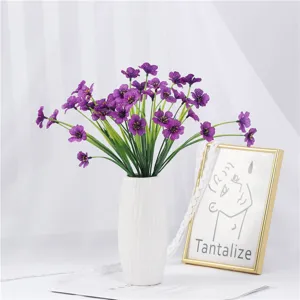 Artificial violet flower potted plant faux silk floral arrangement for home indoor decor.