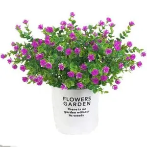 Artificial purple flowers in a white pot, perfect for home and wedding decoration.