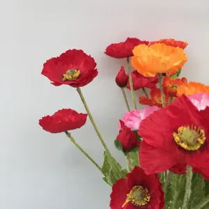 Artificial Iceland poppy flower detail view, realistic fake flower bouquet for decor.