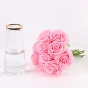Artificial 10-head rose bouquet with glass vase, perfect for home decor and wedding party.