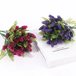 Artificial pine cone flower bundle detail, purple plant prop for home decor and photography display.