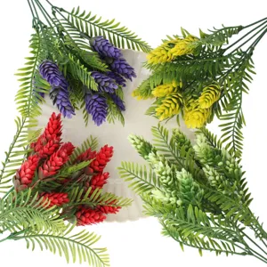 Artificial pine needle flower branch detail view, perfect for decoration and photography props.