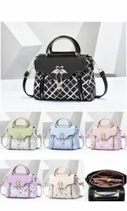 Chic quilted top-handle shoulder bag with elegant swan charm, multi-color fashion crossbody bag.