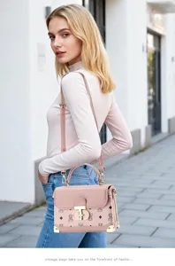 Stylish pink printed shoulder bag for women, luxury crossbody square bag with gold hardware.