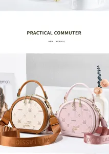 Stylish round crossbody bag for women, PU leather printed casual shoulder handbag with top handle.