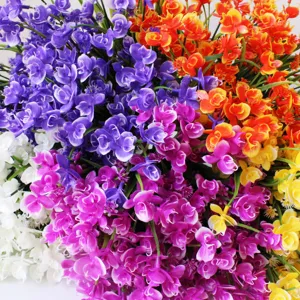 Colorful artificial flower bouquet details close-up, vibrant plastic floral arrangement decor.