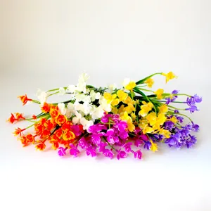 Colorful artificial Phalaenopsis orchid flowers bouquet plastic home decor floral arrangement.