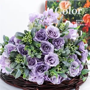 Detail shot of artificial purple rose hydrangea flower bouquet in woven basket for home decor.