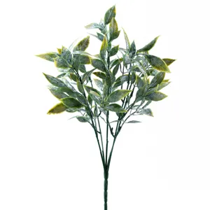 Close-up detail of artificial eucalyptus leaves bouquet fake greenery branch for wedding decor.