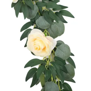 Artificial eucalyptus rose vine detail, lush artificial leaves close up for decor.