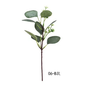 Artificial eucalyptus branch detail with green leaves and small fruit buds for DIY floral arrangement