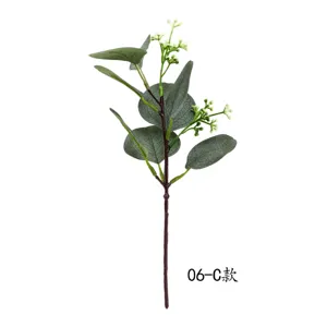 Detailed view of artificial eucalyptus branch with berries, realistic greenery stem for floral DIY.
