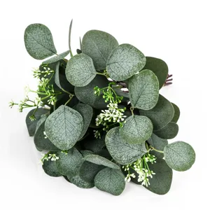Artificial eucalyptus branch details with white berries, realistic leaves for home DIY decor.