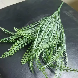 Artificial eucalyptus leaves faux plant for wedding decor, green foliage bouquet styling.
