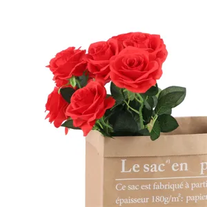 Artificial red roses bouquet detail view, perfect floral arrangement for home decor and wedding.