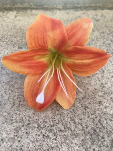 Close-up detail of artificial orange lily flower head, perfect for DIY handmade crafts and accessories.