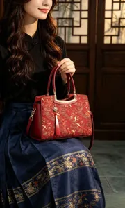 Detailed view of the New Chinese style embroidered shoulder bag featuring classic crane pattern.