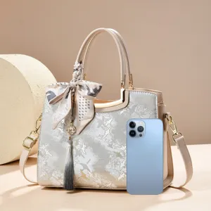 New Chinese style embroidered handbag with silk scarf and tassel pendant, elegant shoulder bag.
