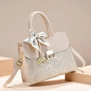 Beige top handle tote bag for women with elegant embroidery crossbody strap and chic silk scarf