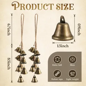 Vintage metal hanging bells with rustic hemp rope, retro holiday decor and wind chime design.