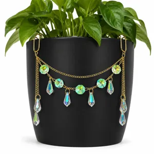 Detailed view of hanging crystal suncatcher chain decoration for flower pots and home plants.