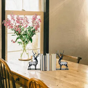 Creative metal deer bookends for home and office desk decoration, stylish black book organizer.