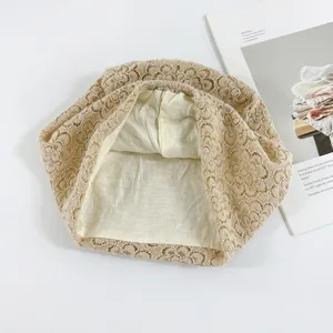 Detail view of Korean style floral jacquard slouchy hat, elegant beige lace beanie for women.