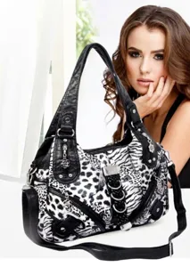 Women black and white animal print shoulder bag fashion PU leather handbag with crossbody strap.