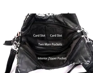 Detailed interior view showing multiple compartments of the black leather shoulder bag.