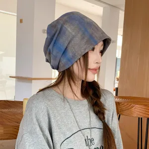 Slouchy tie-dye beanie detail showing soft fabric, cozy fit, and stylish retro look.
