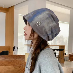 Retro tie-dye slouchy beanie with metal star charm, stylish loose autumn winter hat for women.