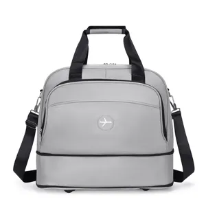 Large capacity grey travel duffel bag with shoulder strap and airplane logo for business trips.