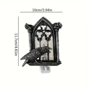 Detailed view of the gothic crow resin night light showing texture and plug switch.