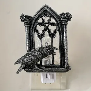 Gothic raven night light resin wall decor detail, vintage spooky Halloween illumination.