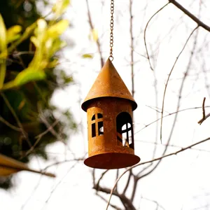Rustic metal castle candle holder pendant hanging ornament for home and garden decoration.