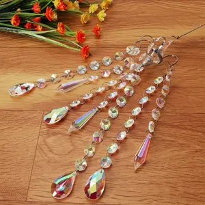 Crystal glass suncatcher hanging pendant, prismatic beads detail for indoor window garden decor.