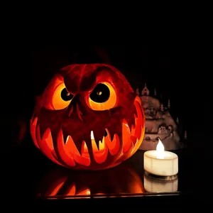 Halloween resin hollow pumpkin lantern tabletop ornament, glowing spooky Jack-o'-lantern decor for party.