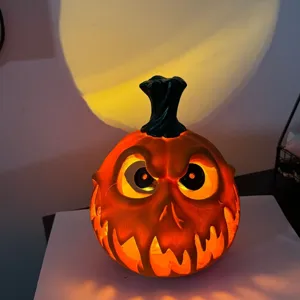 Resin hollow pumpkin ornament detail, spooky carved face design, perfect for Halloween home decor.