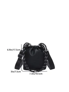 Black leather bucket bag with thick strap and clear dimension details for daily casual wear.