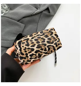 Stylish women leopard print shoulder bag clutch, trendy chic everyday fashion accessory.