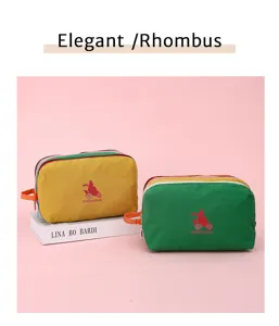 Multi-layer nylon cosmetic bag with color block design, lightweight and waterproof for travel.