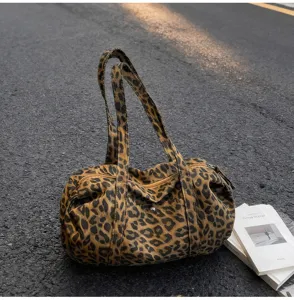 Chic leopard print canvas shoulder bag for women, retro casual underarm handbag daily use.