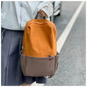 Casual colorblock backpack for outdoor travel, stylish and spacious daily daypack for women.