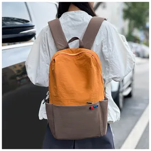 Dopamine color block waterproof backpack for outdoor travel, casual large capacity rucksack.