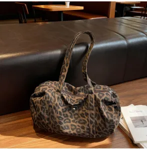 Vintage leopard print canvas shoulder bag, casual retro tote handbag for women daily commute.