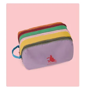 Colorful nylon waterproof makeup bag with multi layers and large capacity for travel.