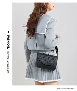Black leather crossbody bag for women, stylish studded shoulder handbag with premium cowhide.