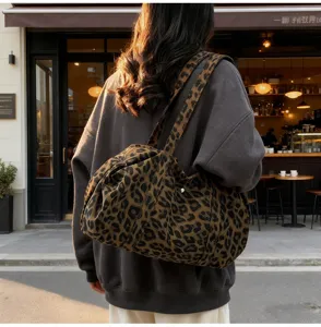Trendy leopard print canvas shoulder bag, vintage casual underarm bag for stylish women.