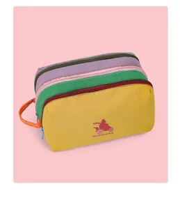 Multi-layer color block nylon cosmetic bag large capacity travel wash bag with handle.